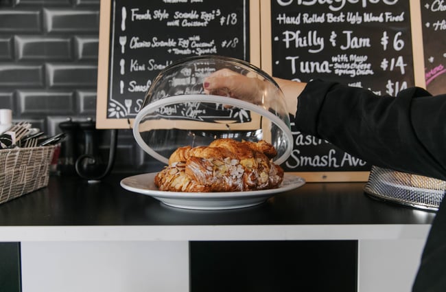 Close up of plate of almond croissants.