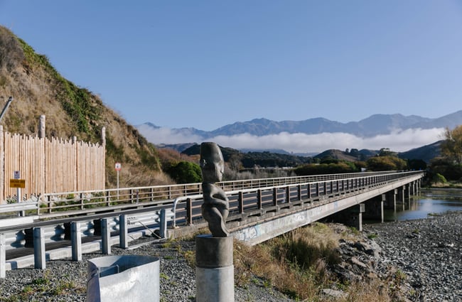 Māori carving sitting beside State Highway 1, Kaikōura.