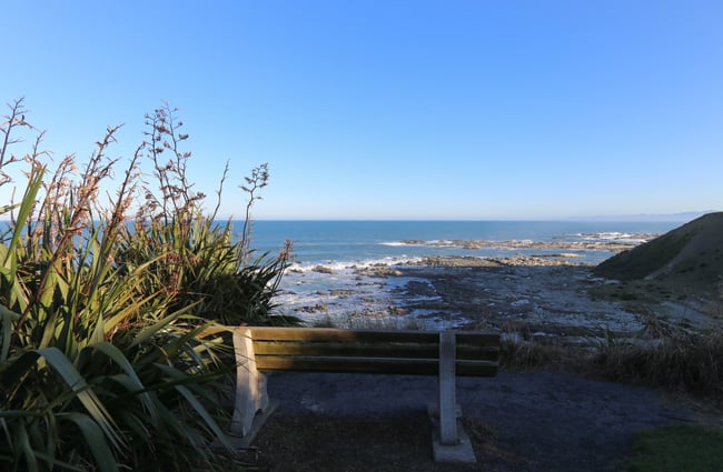 Bench with ocean views on Kaikōura Peninsula Walkway, Kaikōura.