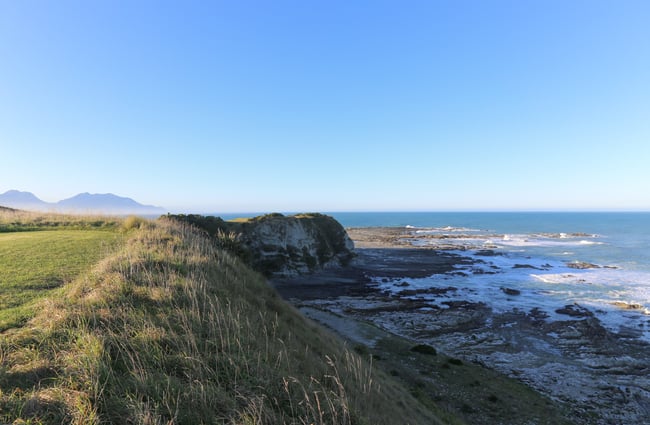 View of lush green and ocean views on Kaikōura Peninsula Walkway, Kaikōura.