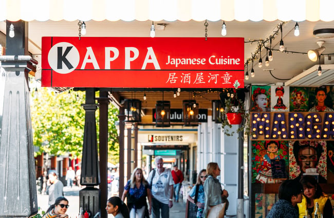 The red and white sign outside Kappa in Queenstown.