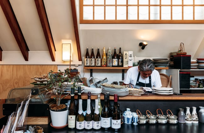 A chef working in the kitchen at Kappa Queenstown.