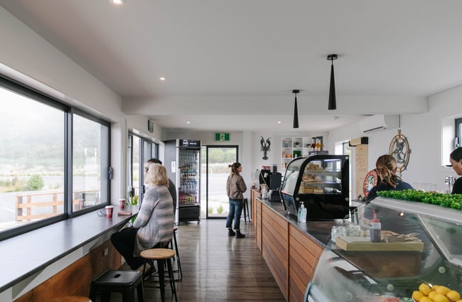 Interior view of Karaka Lobster with customers.