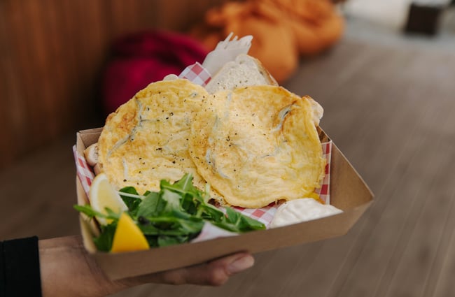 Whitebait fritters in a takeaway box from Karaka Lobster.