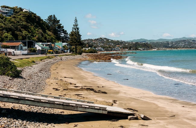 A wooden ramp leading down to the beach.