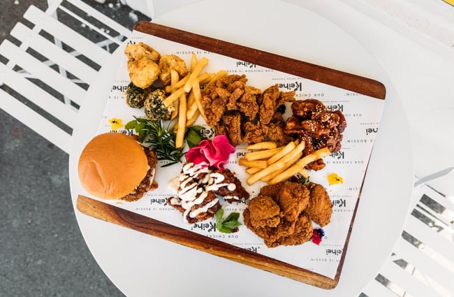 A birdseye view of fried chicken and chips.