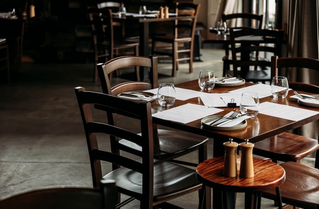 A sleek table setting for four inside kika.