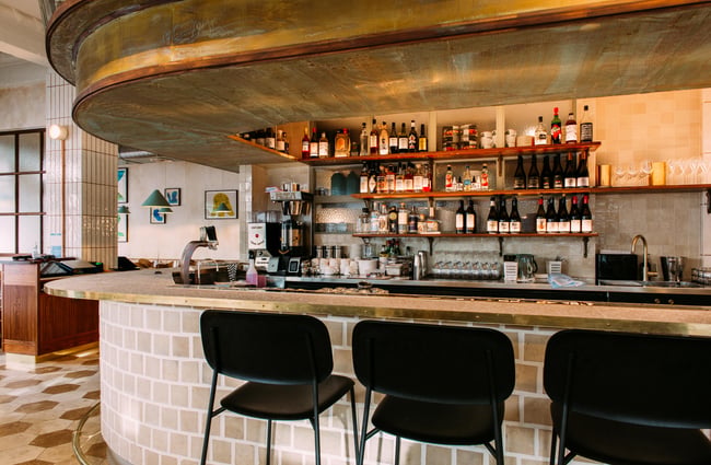 Sit at the bar at Kisa.