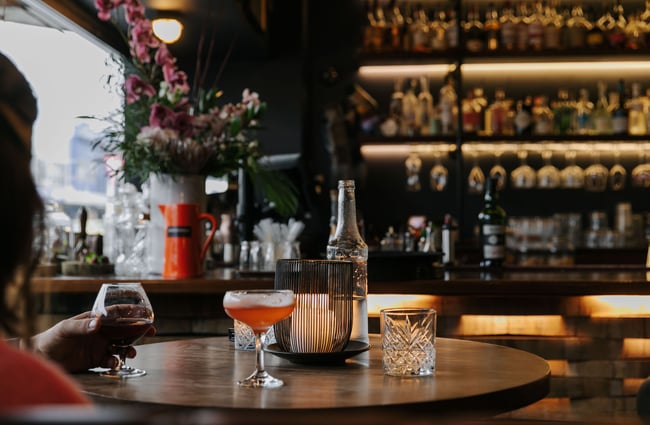 Couple enjoying drinks at Kismet.