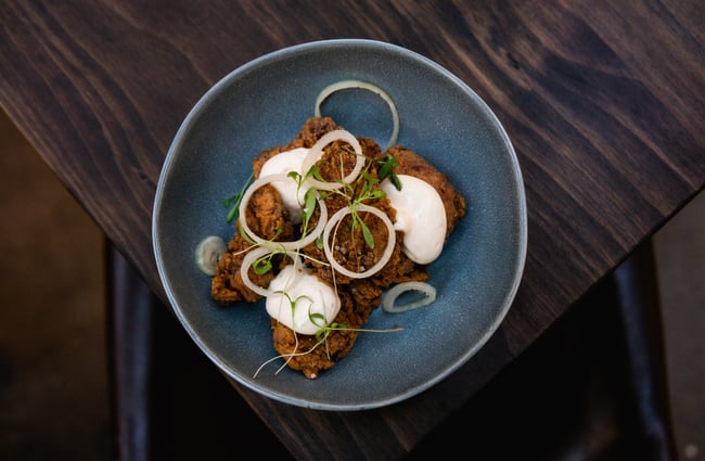A close up of a plate of food on a table.
