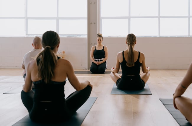 Instructor leading breath class at Kula Studio in Christchurch