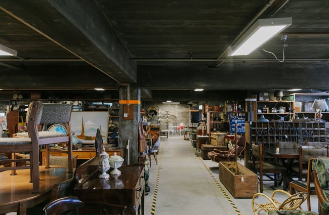 Interior of La Voute in Christchurch with lots of vintage furniture on display.