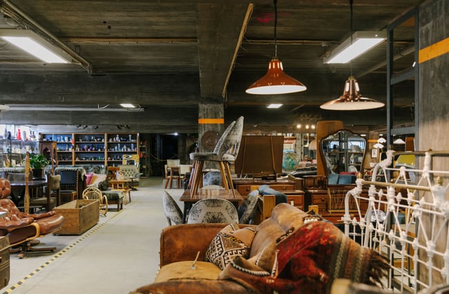 Wide angle view of interior with furniture and lighting at La Voute, Christchurch.