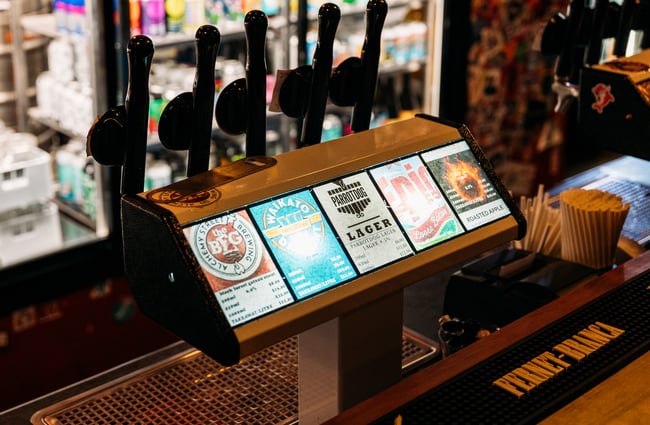 Beer tap handles at the bar at Last Place Bar.