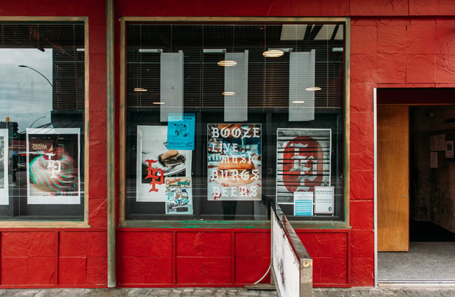 The red entrance to Last Place Bar in Hamilton.