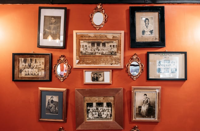 Old photos decorate the walls at Le Ciel.
