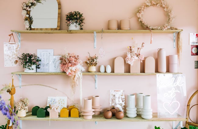 Vases on shelves at Le Fleur Florist.