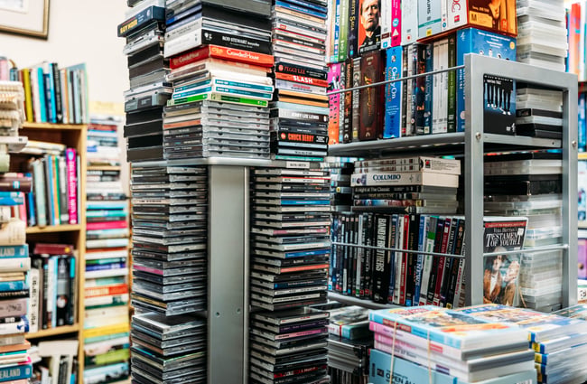 Stack of CDs at Liberty Books.
