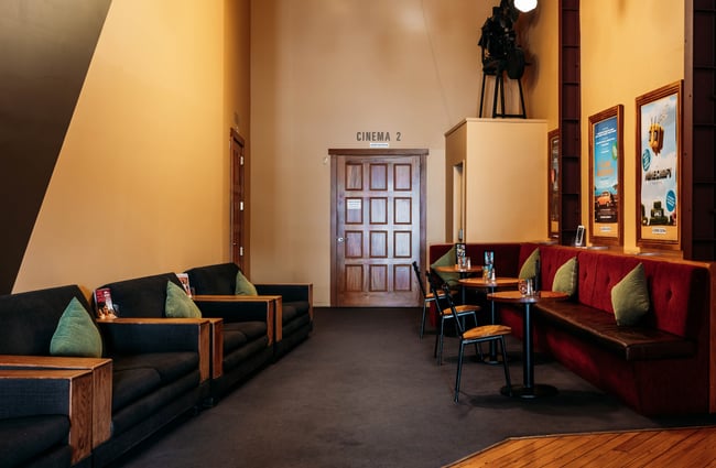 Seating area outside cinema 7 at Light House Cinema.