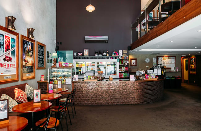 The counter and seating are inside reception at Light House.