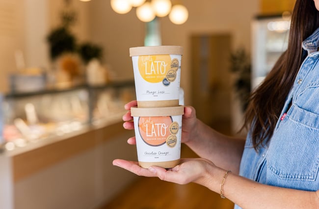 A close up of two tubs of gelato.