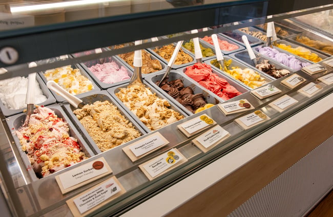 Close up of gelato in tubs.