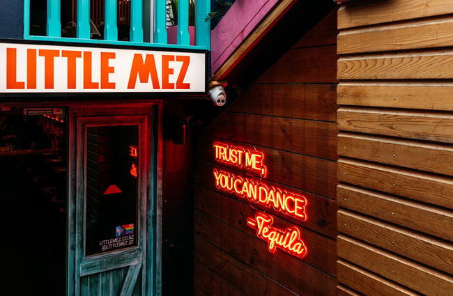 A close up of Little Mez signage.