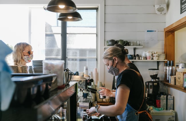 Woman working behind the counter at Little Vintage Espresso, North Canterbury.