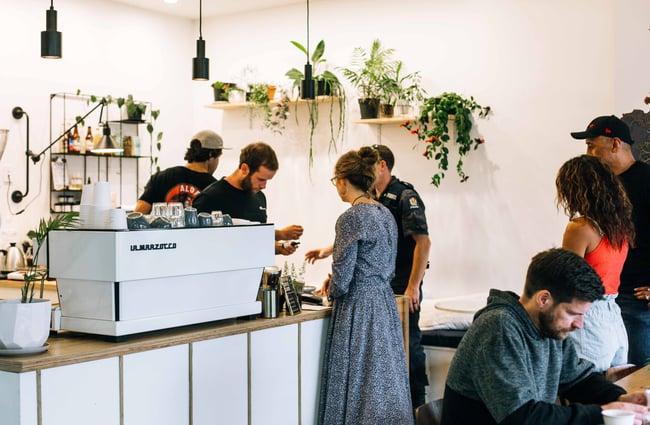 White counter and coffee machine.