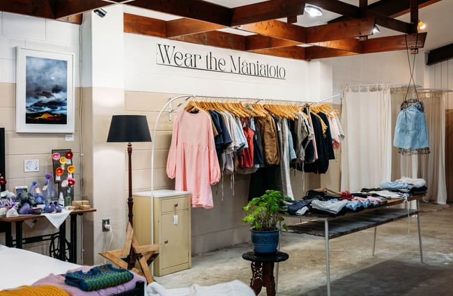 Clothes on display inside a retail store.