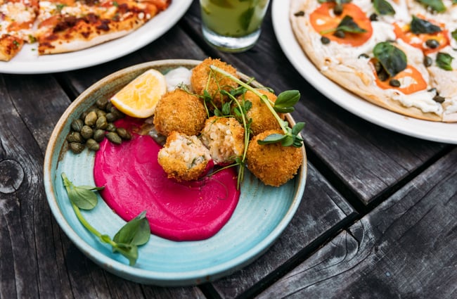 Risotto balls on a plate.