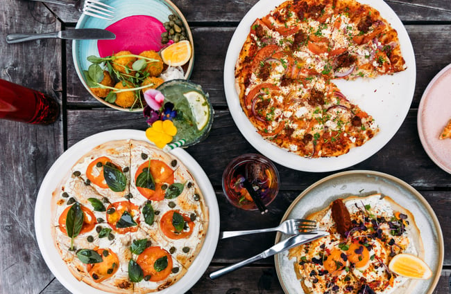 A flatlay of pizza on a table.