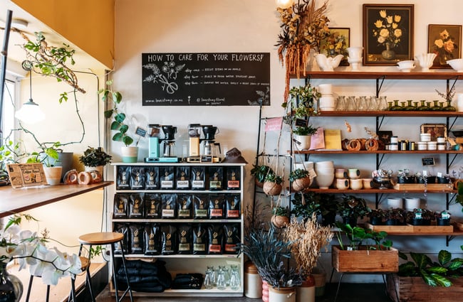 Products for sale on shelves at Love Stomp.