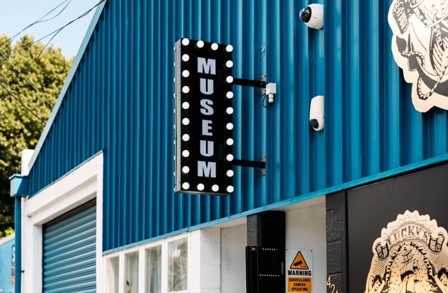 Exterior signage at Lucky's Tattoo Museum.
