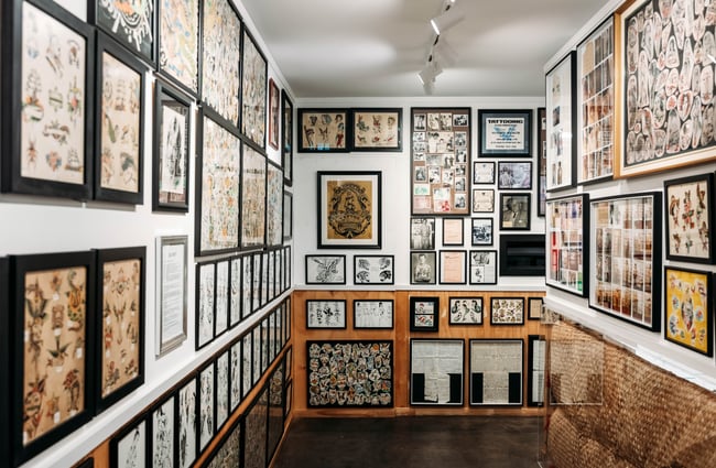 Walls covered in displays at Lucky's Tattoo Museum.