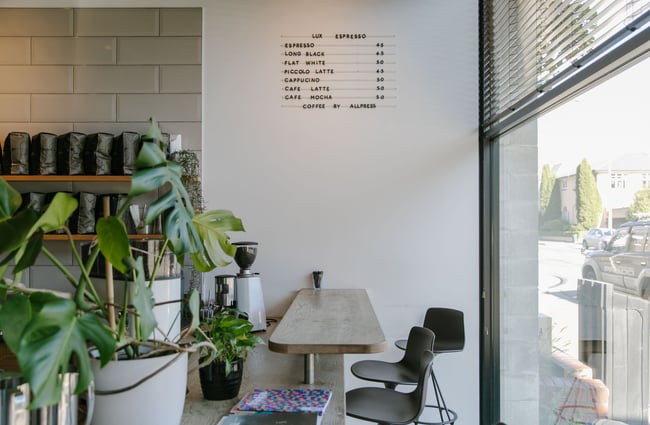 The bench seating next to the counter inside Lux Espresso Christchurch.