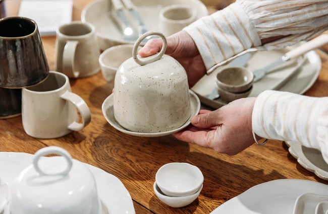 Ceramic butter bell being picked up by a customer at Mabel Vickers.