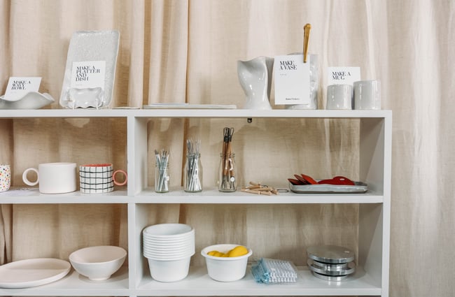 A variety of ceramics on display on a shelf at Mabel Vickers.