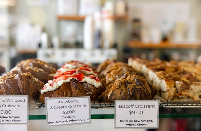 A close up of filled croissants.