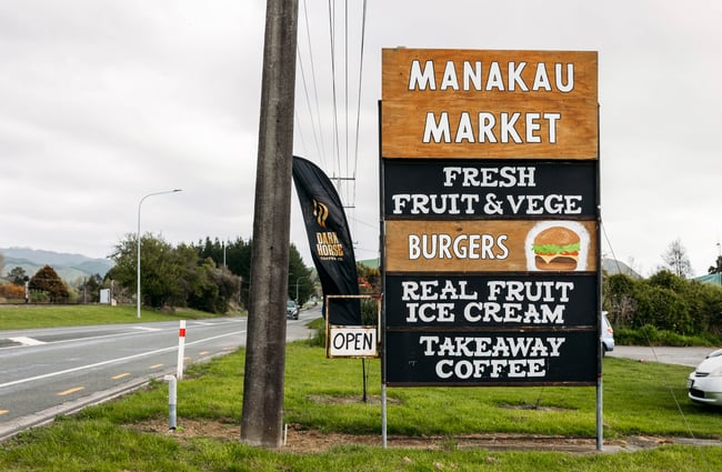 Large roadside signage for Manakau Market.