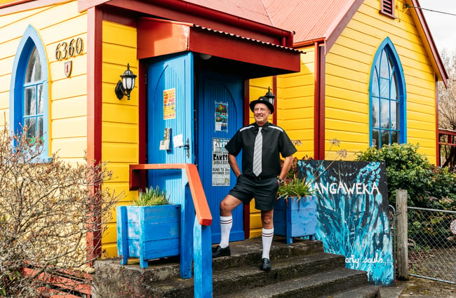 A man posing outside Mangaweka Gallery in Rangitikei.