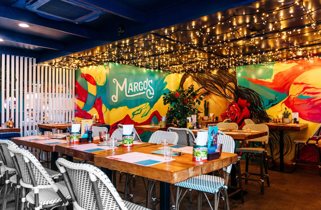The colourful dining interior of a Mexican restaurant.