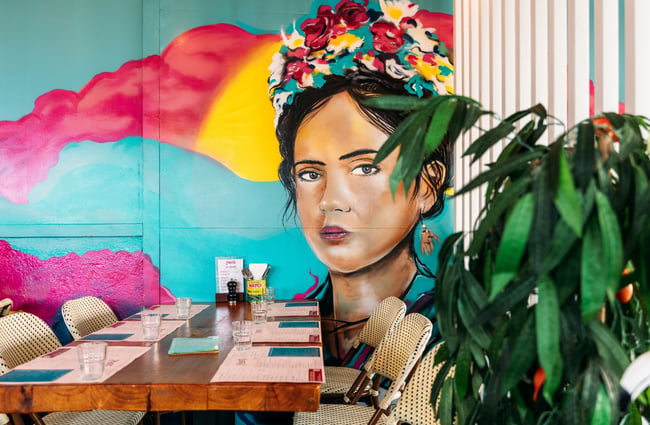 A painted mural on a wall.