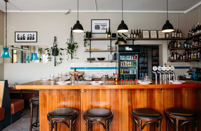 The busy bar counter inside Margot.