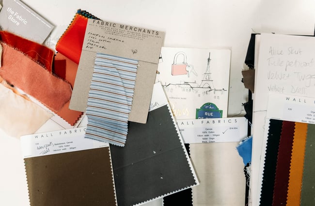 Fabric swatches on a wall.