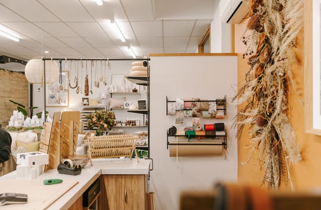 Behind the counter at Matilda and The Metalman, Fairlie.