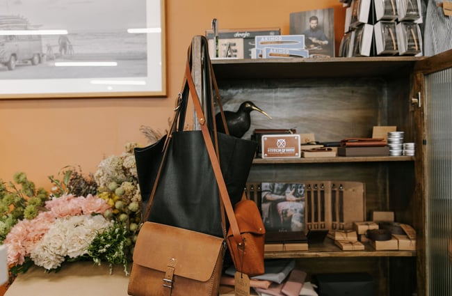 Leather bags and flowers at Matilda and The Metalman, Fairlie.