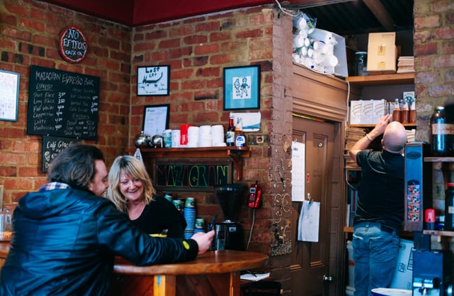 Customers seated inside the coffee shop.