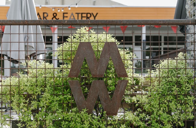 Metal sign for Ministry of Works on the fence in Twizel.