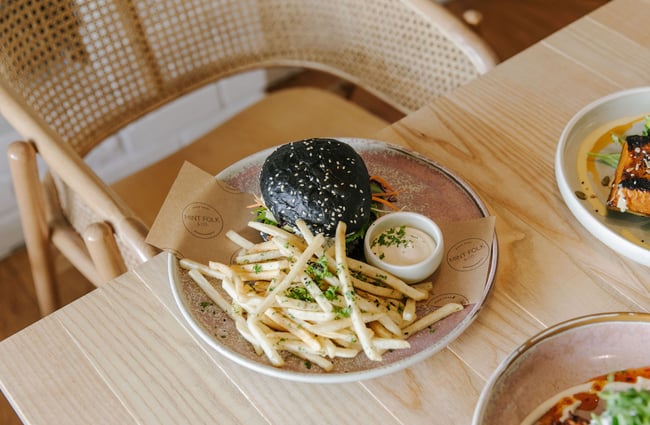 A plate of burger and fries at Mint Folk and Co in Twizel.